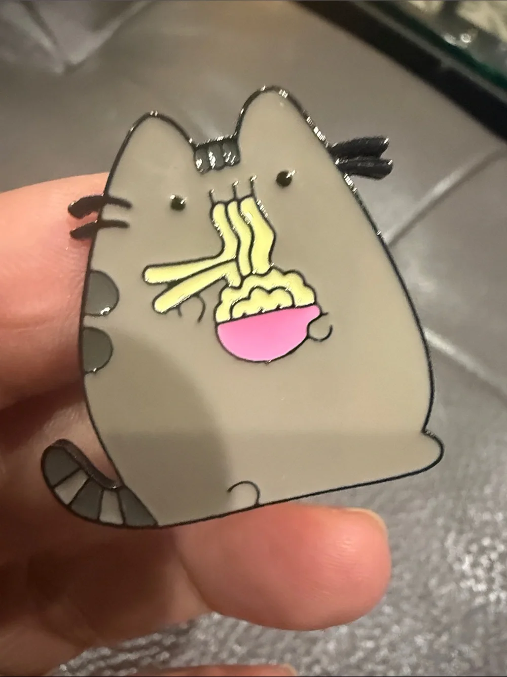 Gray Pusheen Cat Enamel Pin with Pink Bowl and Yellow Noodles